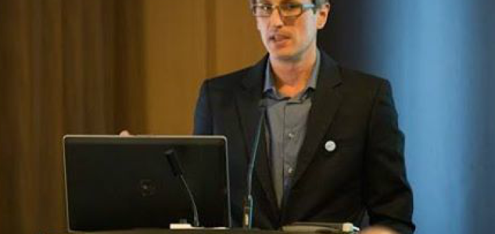 Speaking at a podium