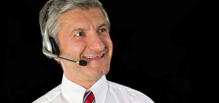 An call center professional wearing white corporate attire
