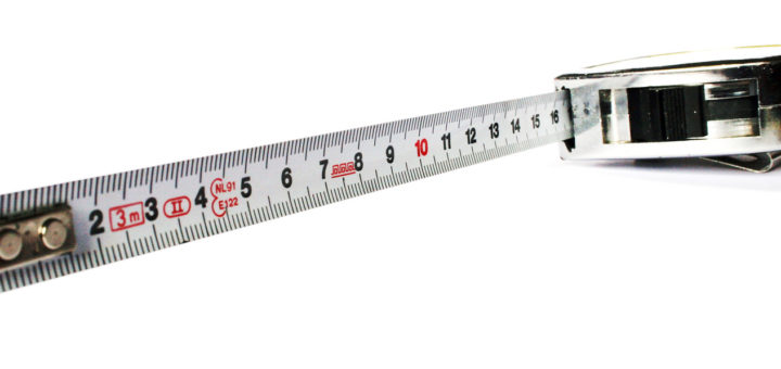 A steel measuring tape partly extended